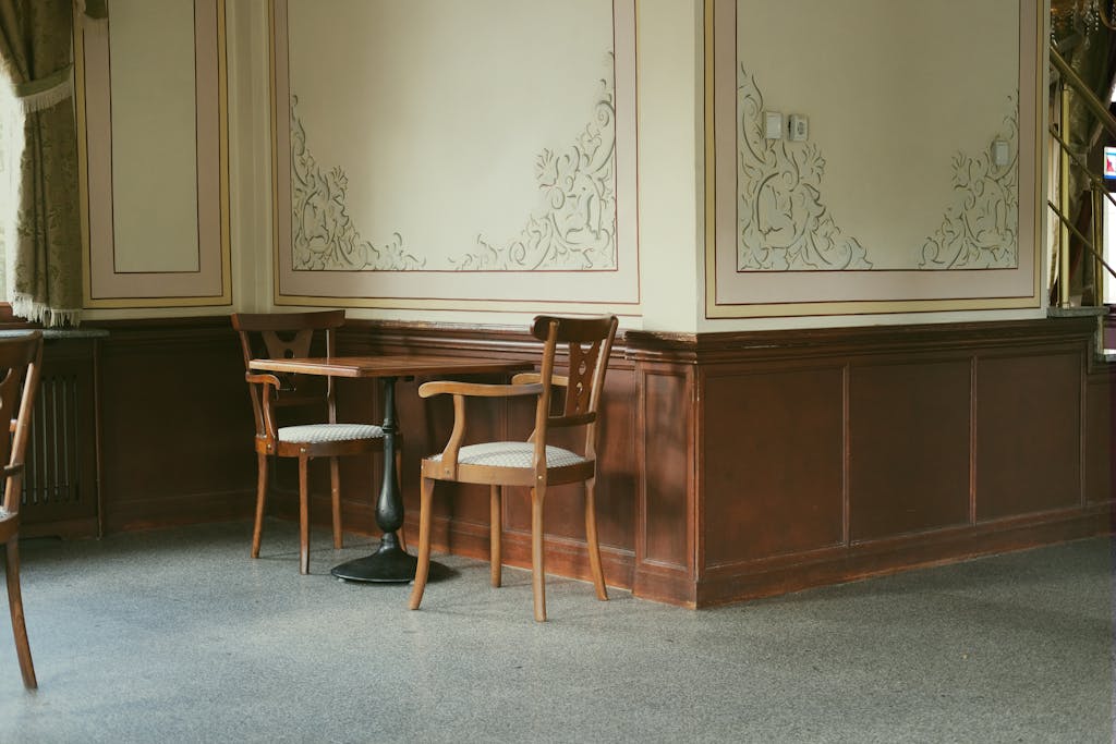 Brown Wooden Chair Beside Brown Wooden Table